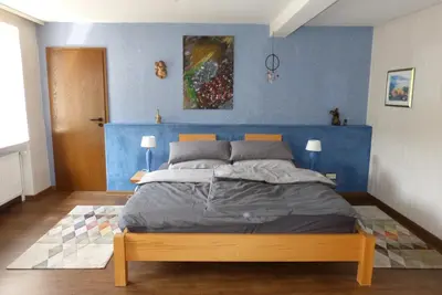 Ein Bett oder Betten in einem Zimmer der Unterkunft Schreiner