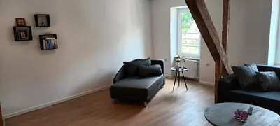 Ein Sitzbereich in der Unterkunft Buergerhaus Zeltingen Fewo