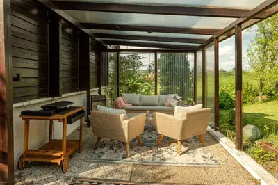 Ein Garten an der Unterkunft Blockhaus Eifelsteig w/ Kamin Garten & Feuerstelle