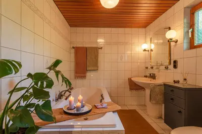Ein Badezimmer in der Unterkunft Blockhaus Eifelsteig w/ Kamin Garten & Feuerstelle