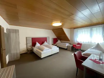 Ein Bett oder Betten in einem Zimmer der Unterkunft Hotel Pension Balthasar