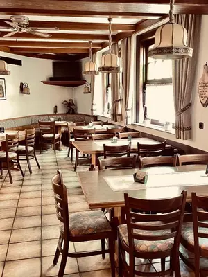 Ein Restaurant oder anderes Speiselokal in der Unterkunft Hotel Pension Balthasar