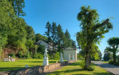 Ein Garten an der Unterkunft Vintage Hotel Petrisberg