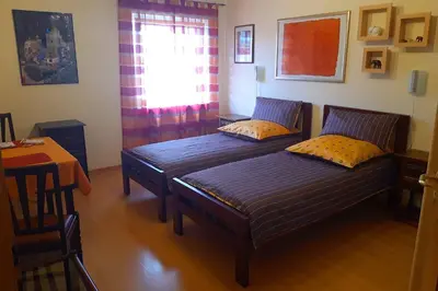 Ein Bett oder Betten in einem Zimmer der Unterkunft Gästezimmer Leonore