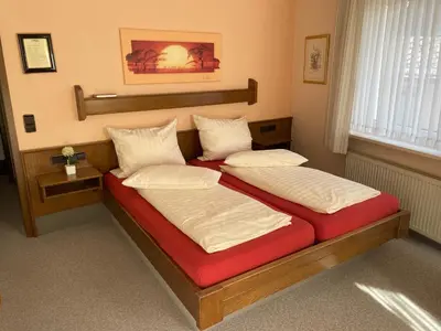 Ein Bett oder Betten in einem Zimmer der Unterkunft Café Bäckerei Pension Alcana Mirco Münch