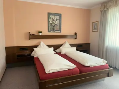 Ein Bett oder Betten in einem Zimmer der Unterkunft Café Bäckerei Pension Alcana Mirco Münch