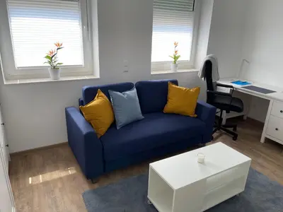 Ein Sitzbereich in der Unterkunft Apartment in Mayen Zentrum nur 100 Meter
