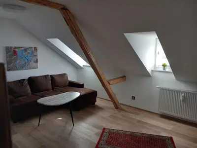 Ein Sitzbereich in der Unterkunft Ferienwohnung im roten Haus, die Therme ist fußläufig in 350m zu erreichen