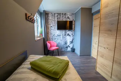 Ein Bett oder Betten in einem Zimmer der Unterkunft Vulkan Villa