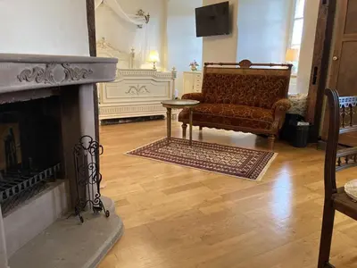 Ein Sitzbereich in der Unterkunft Napoleonzimmer / Studio