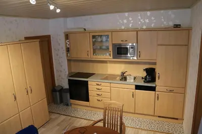 Küche/Küchenzeile in der Unterkunft Gästehaus Rheinburgenblick