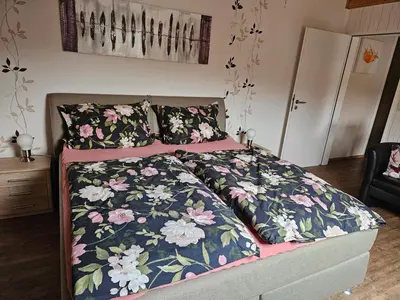 Ein Bett oder Betten in einem Zimmer der Unterkunft Mathildas Ferienwohnung