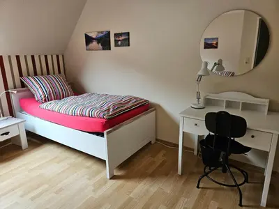 Ein Bett oder Betten in einem Zimmer der Unterkunft Mathildas Ferienwohnung