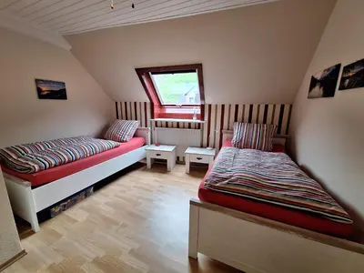 Ein Bett oder Betten in einem Zimmer der Unterkunft Mathildas Ferienwohnung
