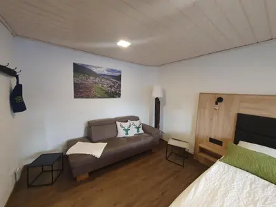 Ein Bett oder Betten in einem Zimmer der Unterkunft Bleibe in der Brandgasse