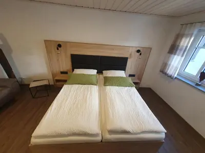 Ein Bett oder Betten in einem Zimmer der Unterkunft Bleibe in der Brandgasse
