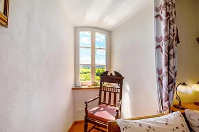 Ein Sitzbereich in der Unterkunft Kristallzimmer - Studio