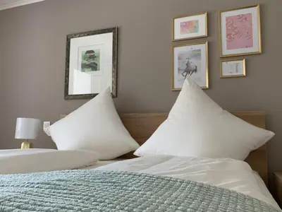 Ein Bett oder Betten in einem Zimmer der Unterkunft Haus Astrid