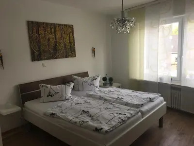 Ein Bett oder Betten in einem Zimmer der Unterkunft Pension 
