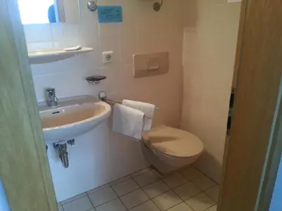 Ein Badezimmer in der Unterkunft Pension 