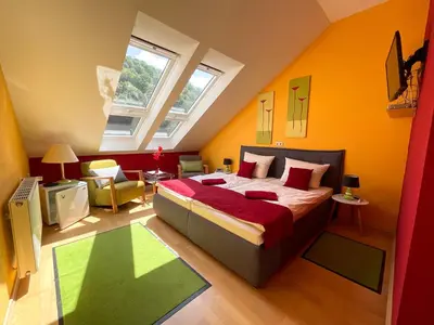 Ein Bett oder Betten in einem Zimmer der Unterkunft Landhaus Zum Langenstein