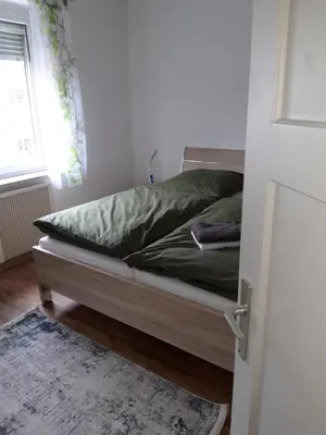Ein Bett oder Betten in einem Zimmer der Unterkunft Ruff un Runner