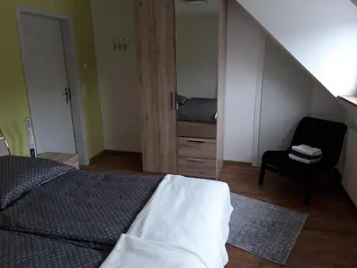 Ein Bett oder Betten in einem Zimmer der Unterkunft Ruff un Runner