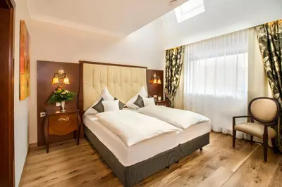 Ein Bett oder Betten in einem Zimmer der Unterkunft Residence Bellevue