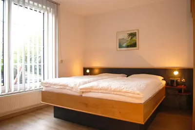 Ein Bett oder Betten in einem Zimmer der Unterkunft Ferienweingut Benedikt Nilles