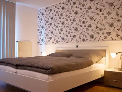 Ein Bett oder Betten in einem Zimmer der Unterkunft Ferienweingut Benedikt Nilles