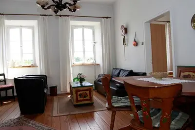 Ein Sitzbereich in der Unterkunft Abtei - wohnen auf einem historischen Weingut