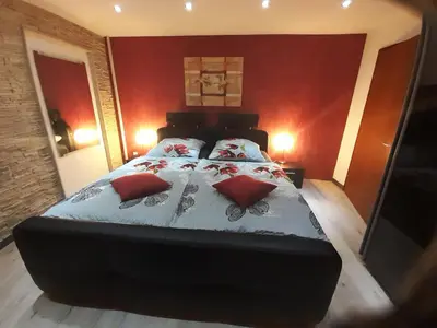 Ein Bett oder Betten in einem Zimmer der Unterkunft Im Vulkanland Fewo bis 6 Personen