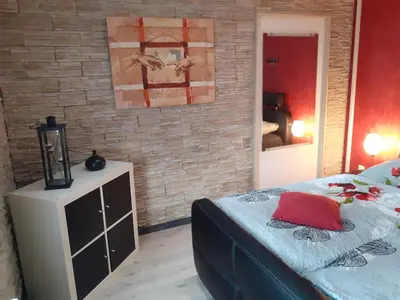 Ein Bett oder Betten in einem Zimmer der Unterkunft Im Vulkanland Fewo bis 6 Personen