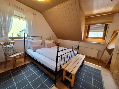 Ein Bett oder Betten in einem Zimmer der Unterkunft Ferienwohnung Herold