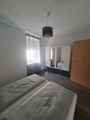 Ein Bett oder Betten in einem Zimmer der Unterkunft Paula Haus Trier