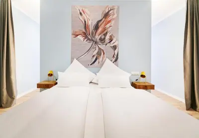 Ein Bett oder Betten in einem Zimmer der Unterkunft Design Studio I 3 Personen I Innenstadt I Küche I WIFI