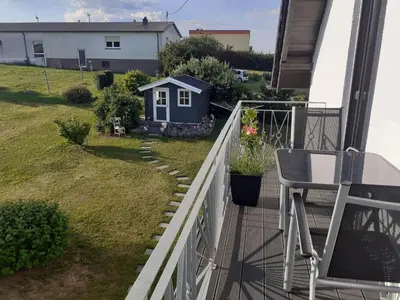 Ein Garten an der Unterkunft EIFELSTERN-Schöne Ferienwohnung mit Balkon