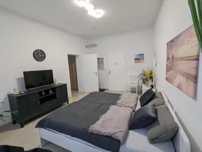 Ein Bett oder Betten in einem Zimmer der Unterkunft Schönes Appartment im Zentrum von Koblenz II