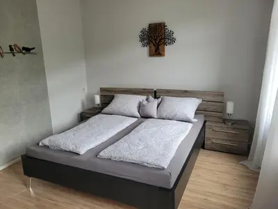 Ein Bett oder Betten in einem Zimmer der Unterkunft Ferienhaus im Moseltal