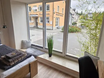 Ein Sitzbereich in der Unterkunft Gästehaus am Viehmarkt