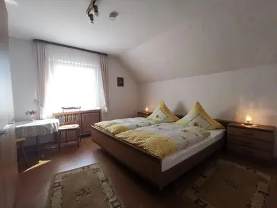 Ein Bett oder Betten in einem Zimmer der Unterkunft Ferienwohnung Schellen Mehren - KEINE Monteurwohnung!