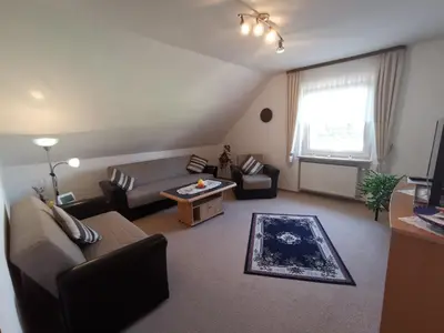 Ein Sitzbereich in der Unterkunft Ferienwohnung Schellen Mehren - KEINE Monteurwohnung!