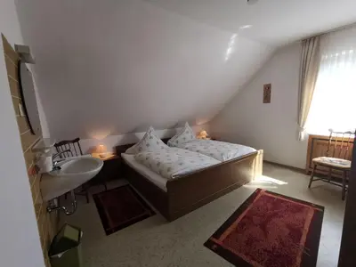 Ein Bett oder Betten in einem Zimmer der Unterkunft Ferienwohnung Schellen Mehren - KEINE Monteurwohnung!