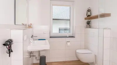 Ein Badezimmer in der Unterkunft Weinquartier Conzen