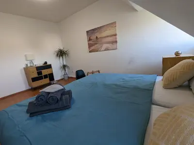 Ein Bett oder Betten in einem Zimmer der Unterkunft Schönes 2 Zimmer Appartment in der Altstadt von Koblenz