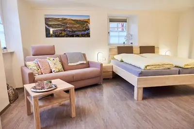 Ein Bett oder Betten in einem Zimmer der Unterkunft Ferienappartements Hermannshöhle