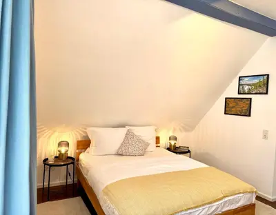 Ein Bett oder Betten in einem Zimmer der Unterkunft RiversideMosel Neumagen