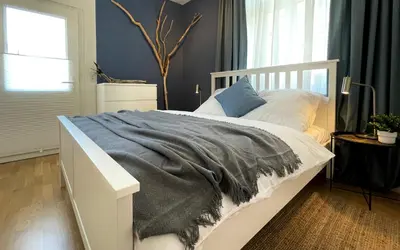 Ein Bett oder Betten in einem Zimmer der Unterkunft RiversideMosel Neumagen