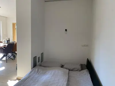 Ein Bett oder Betten in einem Zimmer der Unterkunft Attraktive Wohnung-Elztalidyll-zwischen Mosel,Nürburgring und Burg Eltz