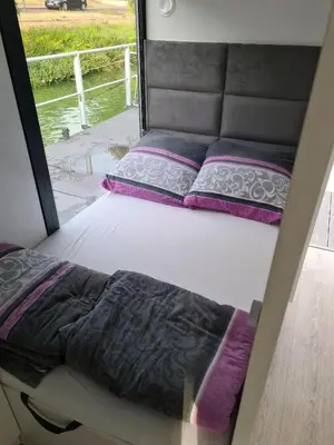 Ein Bett oder Betten in einem Zimmer der Unterkunft Moselcube